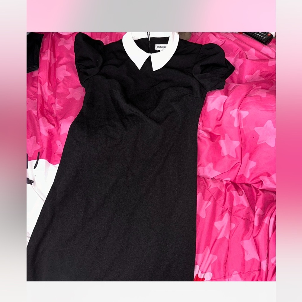 Black dress with a white collar